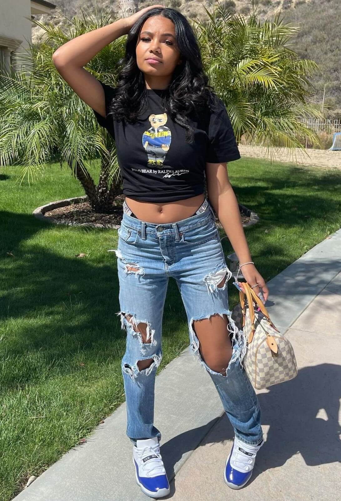 Brooklyn Queen In Black Crop Top With Denim Ripped Jeans