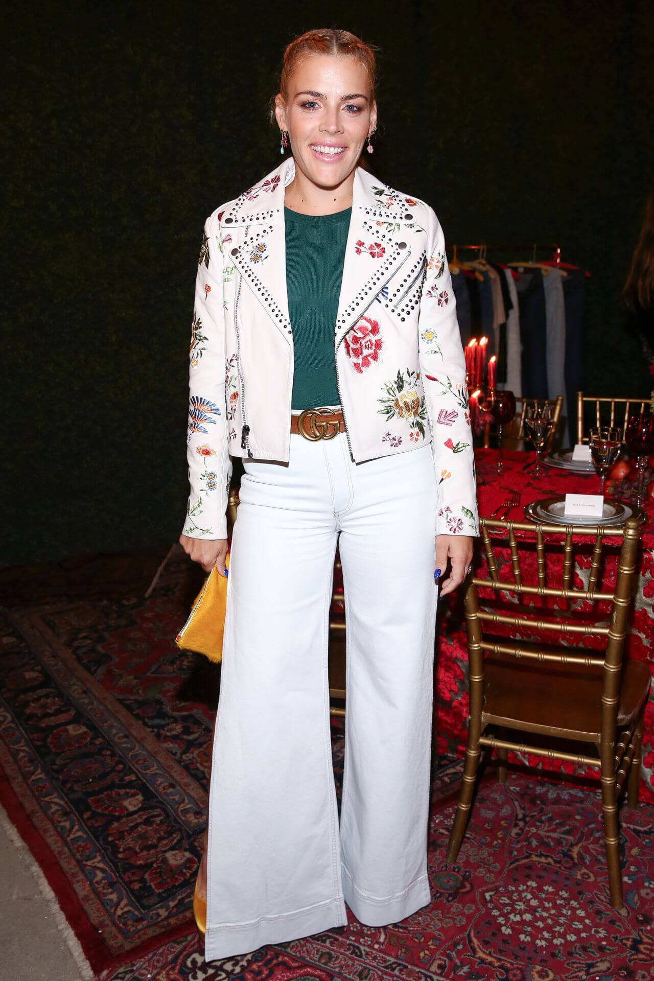 Busy Philipps  In White Embroidery Jacket Under Green Top With Flare Pants At Alice & Olivia Denim Launch Party in Los Angeles