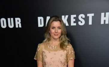 Caggie Dunlop  In Beige Floral Design Half Sleeves Long Gown Dress At“Darkest Hour” Premiere in Los Angeles