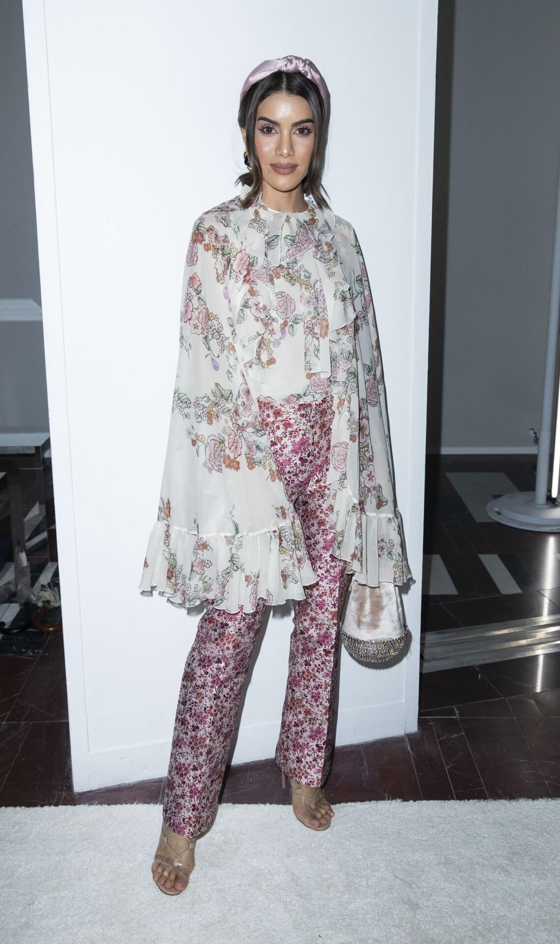 Camila Coelho In White Floral Printed Sheering Flare Sleeves Top With Pants At  Giambattista Valli Fashion Show in Paris