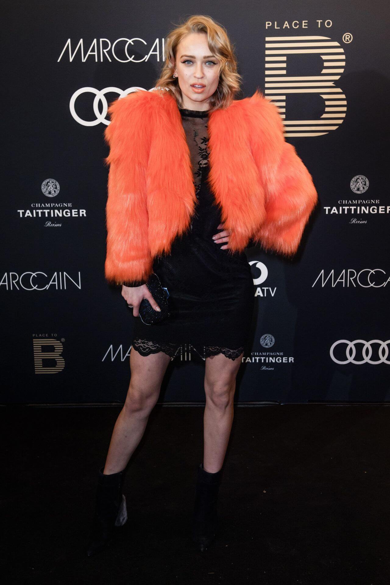 Caro Cult  In An Orange Fur Jacket Under Black Dress At PLACE TO B Pre Berlinale 2018 Dinner