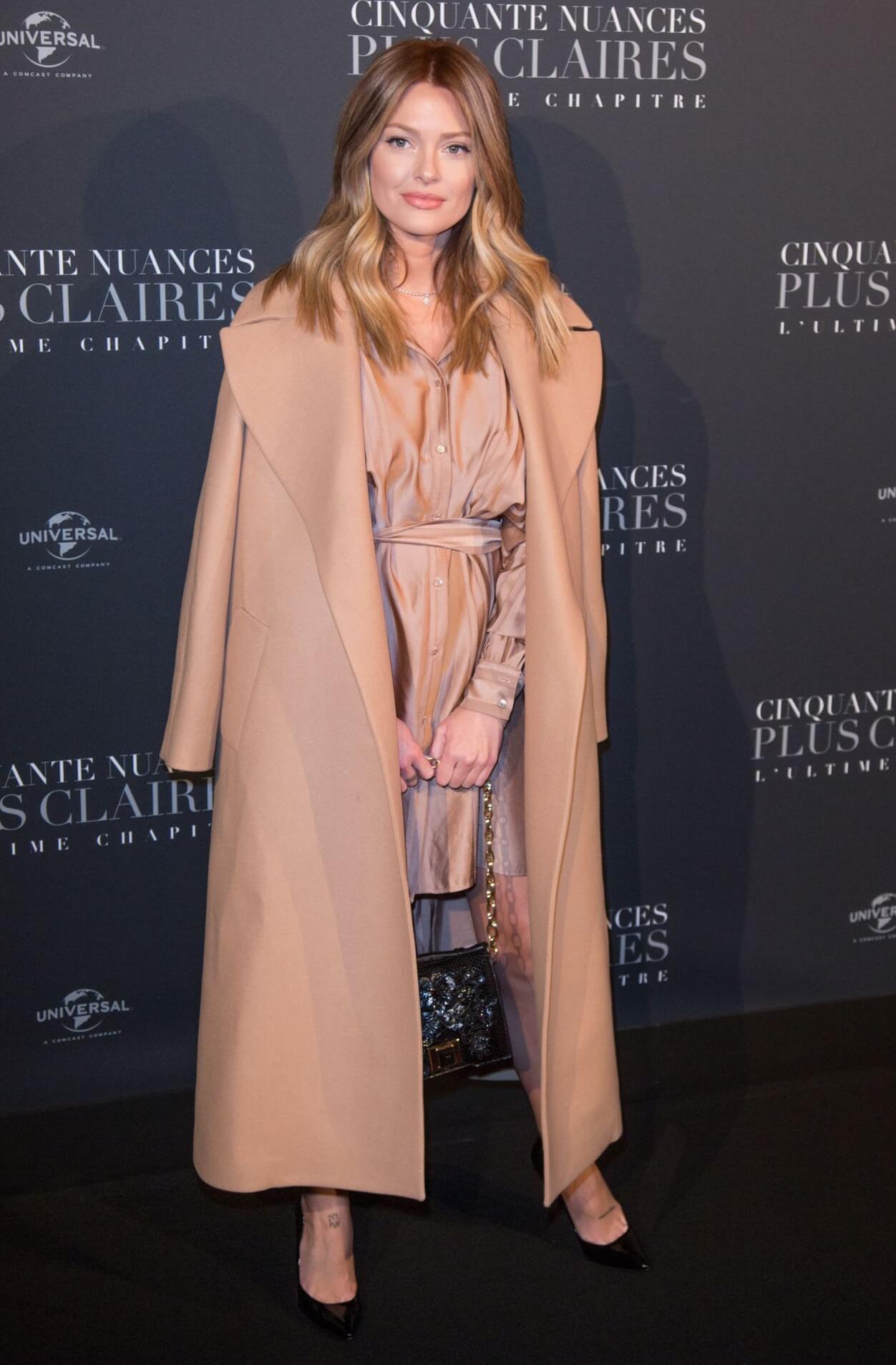 Caroline Receveur  In Beige Overlong Coat Under Short Dress At“Fifty Shades Freed” Premiere in Paris