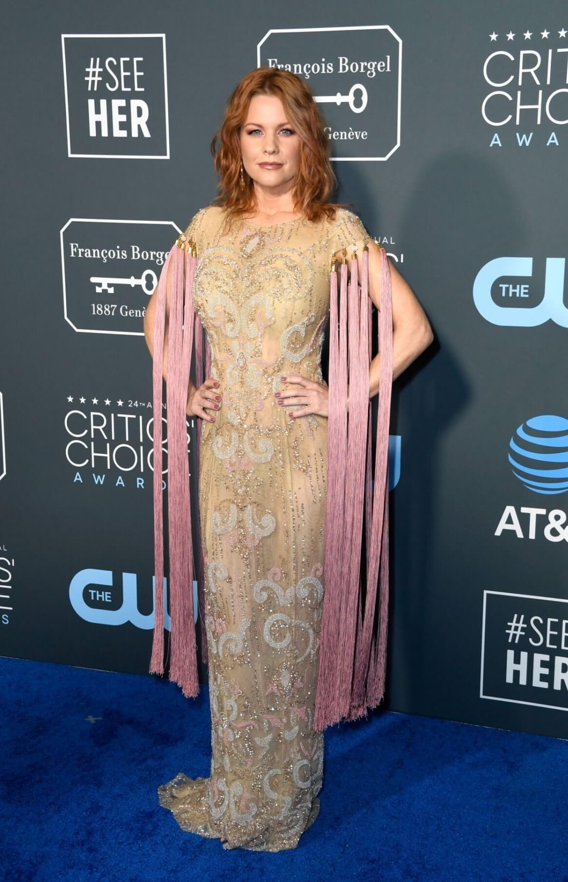 Carrie Keagan In Golden Shimmery With Pearl Design Embedded Long Gown At Critics’ Choice Awards