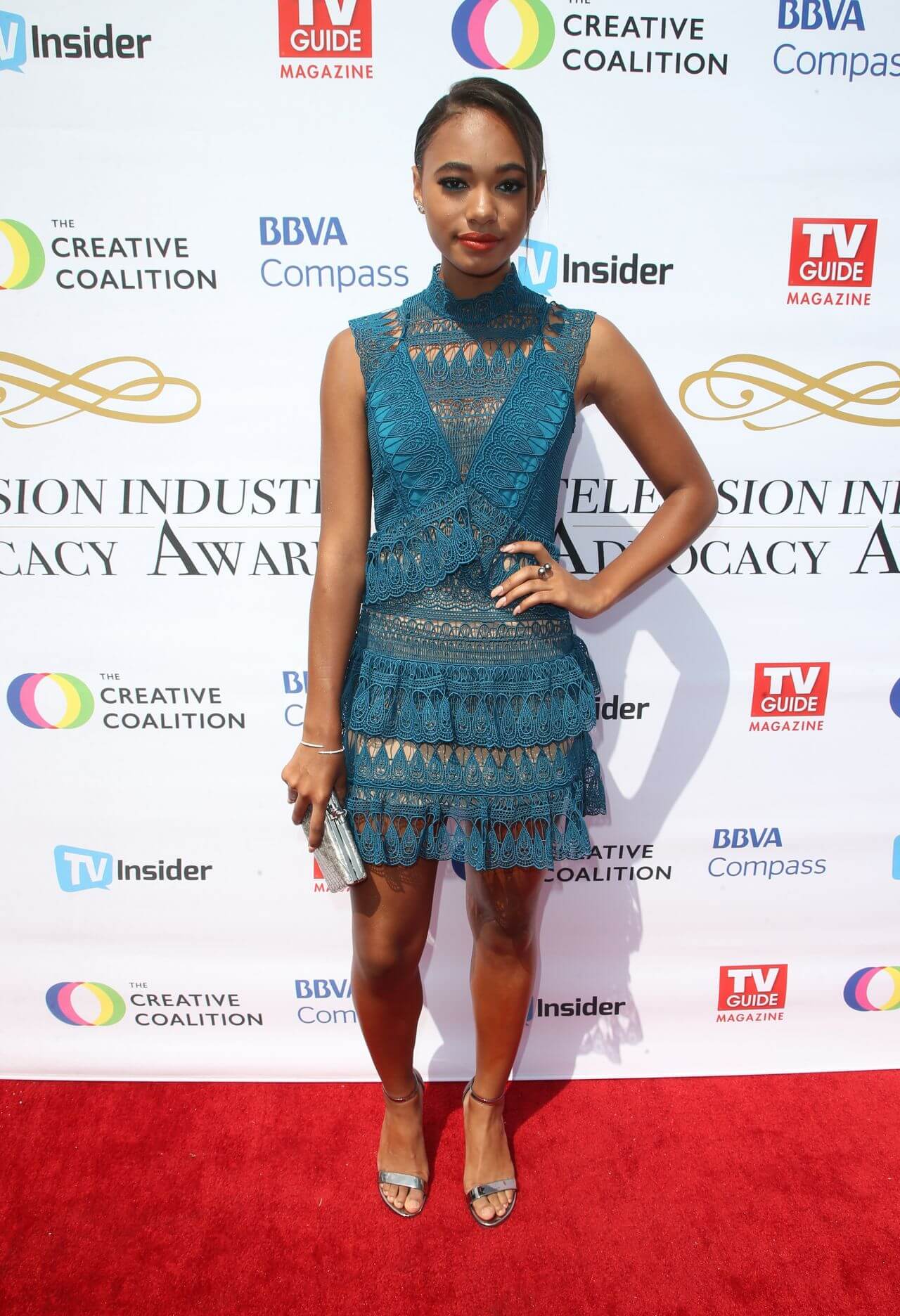 Chandler Kinney In Blue Lace Design Mini Dress At Television Industry Advocacy Awards in LA