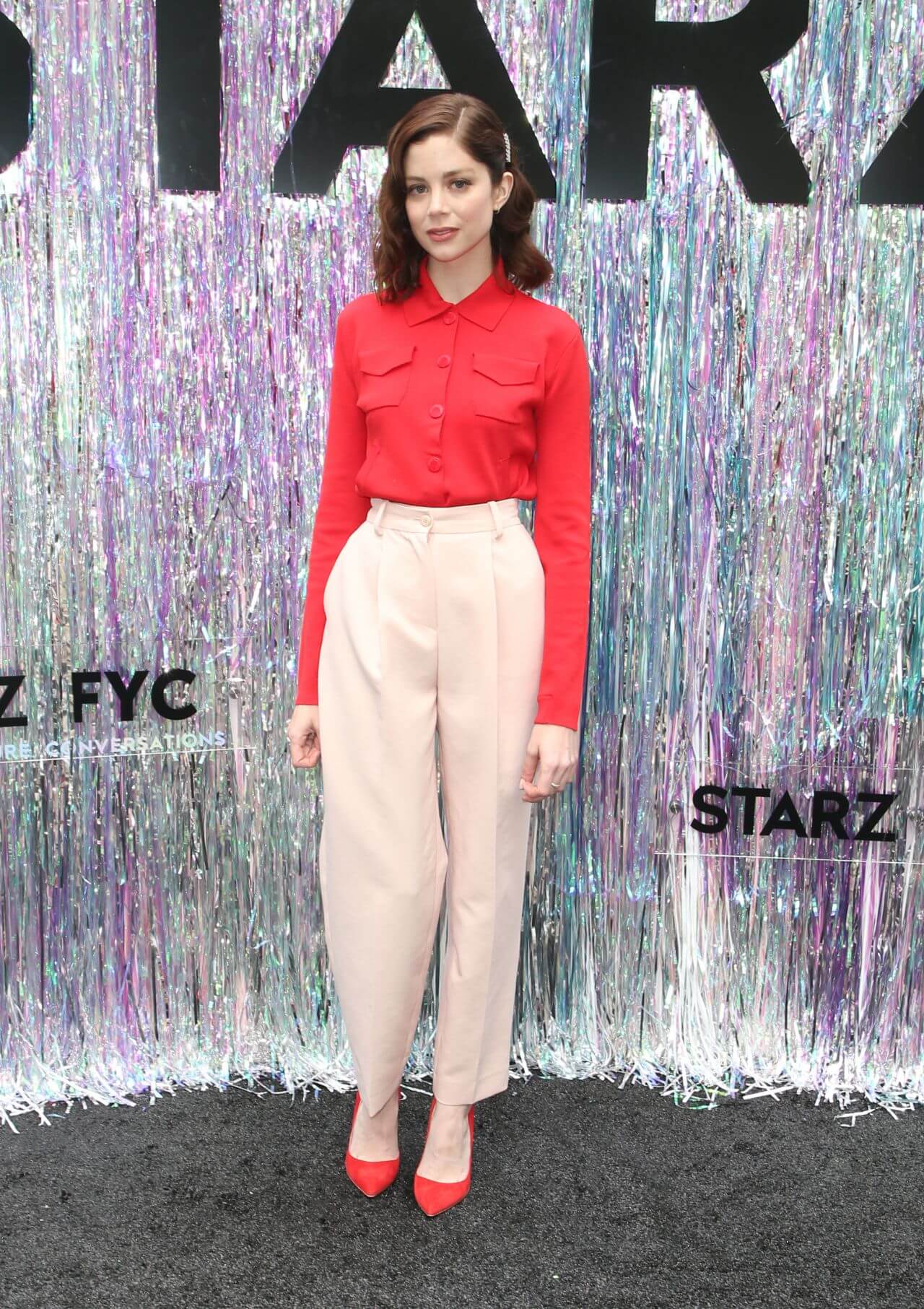 Charlotte Hope In Red Full Sleeves Shirt With Off White Baggy Pants At Starz FYC Event in Century City