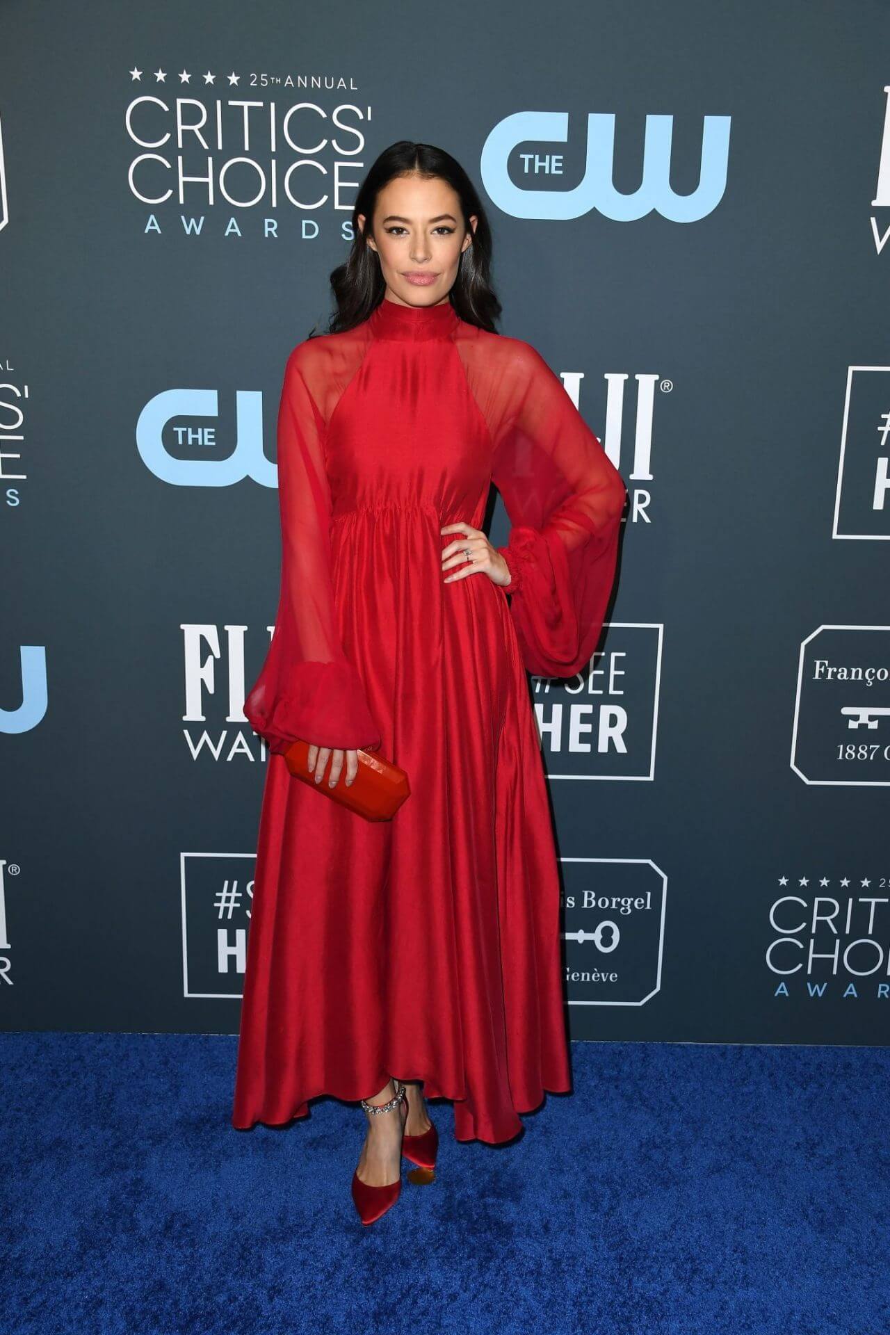 Chloe Bridges  In Shiny Red Baggy Sleeves Pleated Long Gown