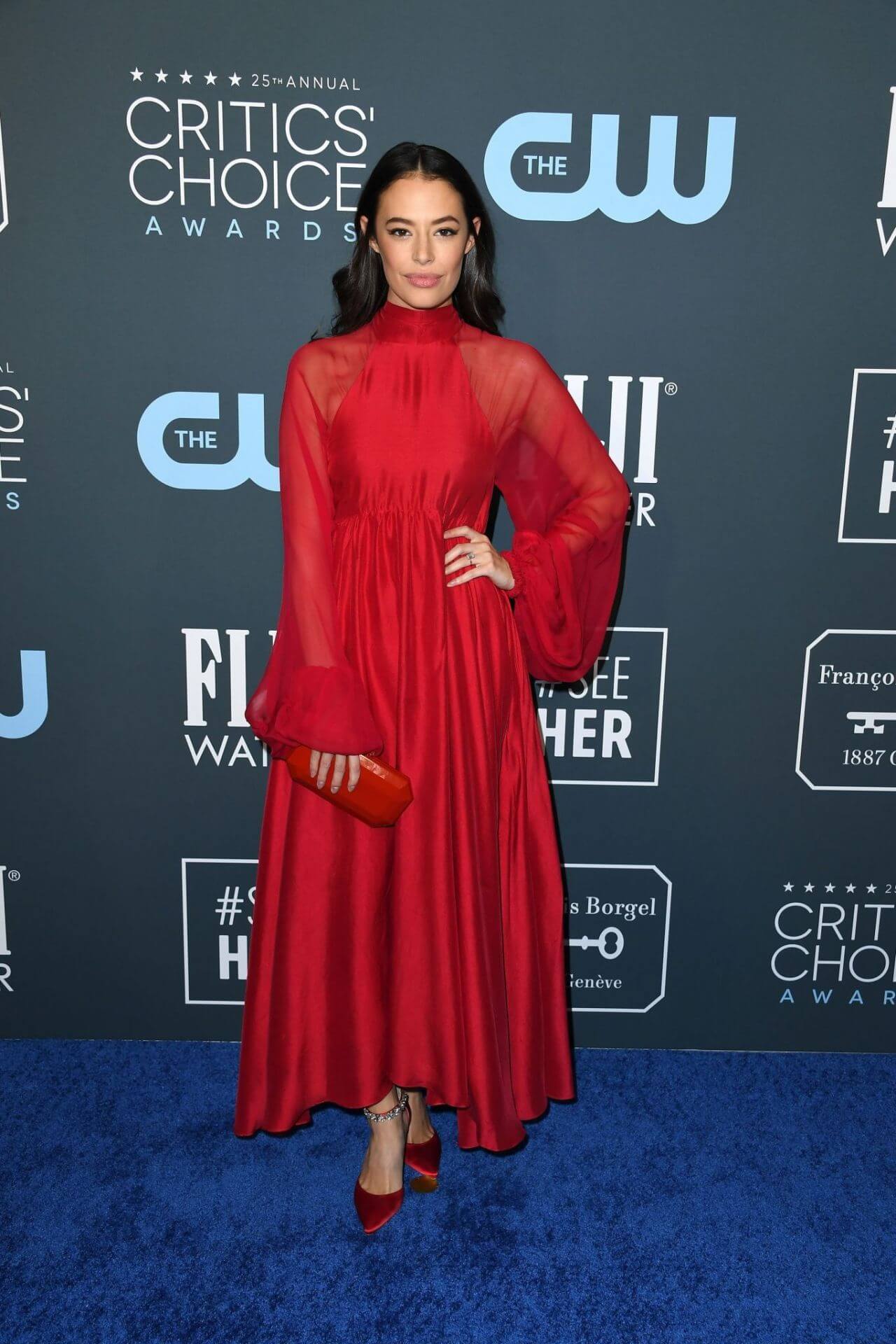 Chloe Bridges  In Shiny Red Baggy Sleeves Pleated Long Gown 