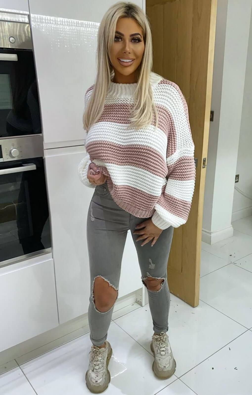 Chloe Ferry In Striped Woolen Sweater With Ripped Jeans Outfits