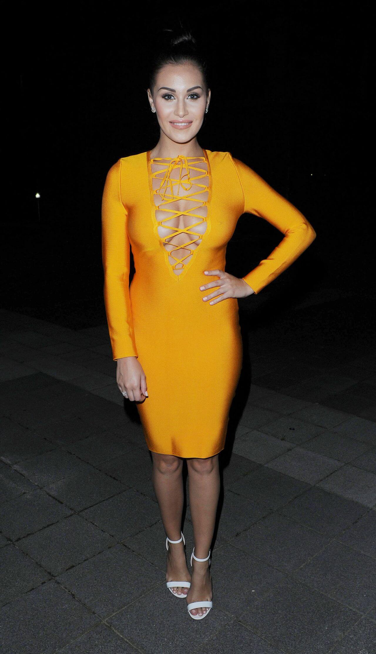 Chloe Goodman In Yellow Cris Cross Strap Full Sleeves Bodycon Dress At London