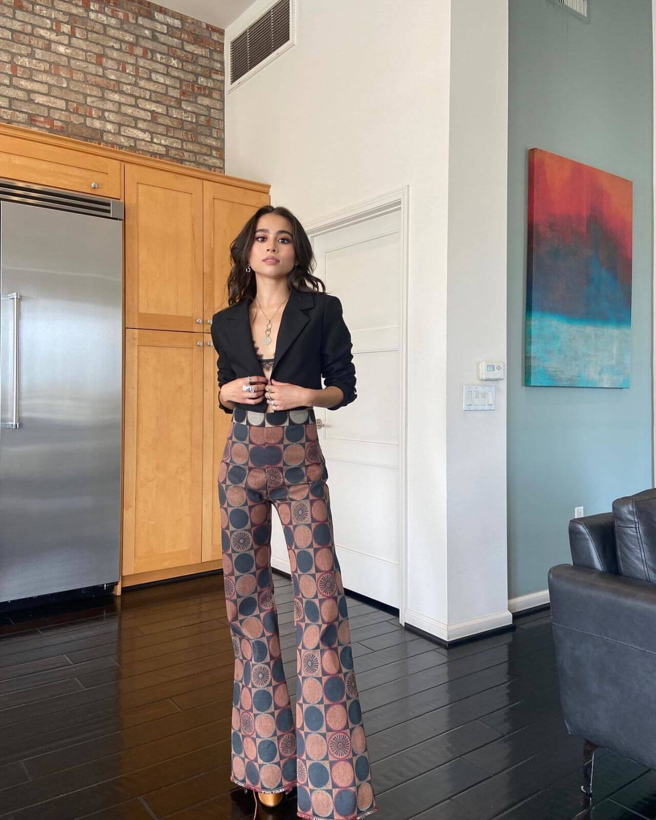 Ciara Riley Wilson In a Black Short Blazer With Printed Pants Outfits