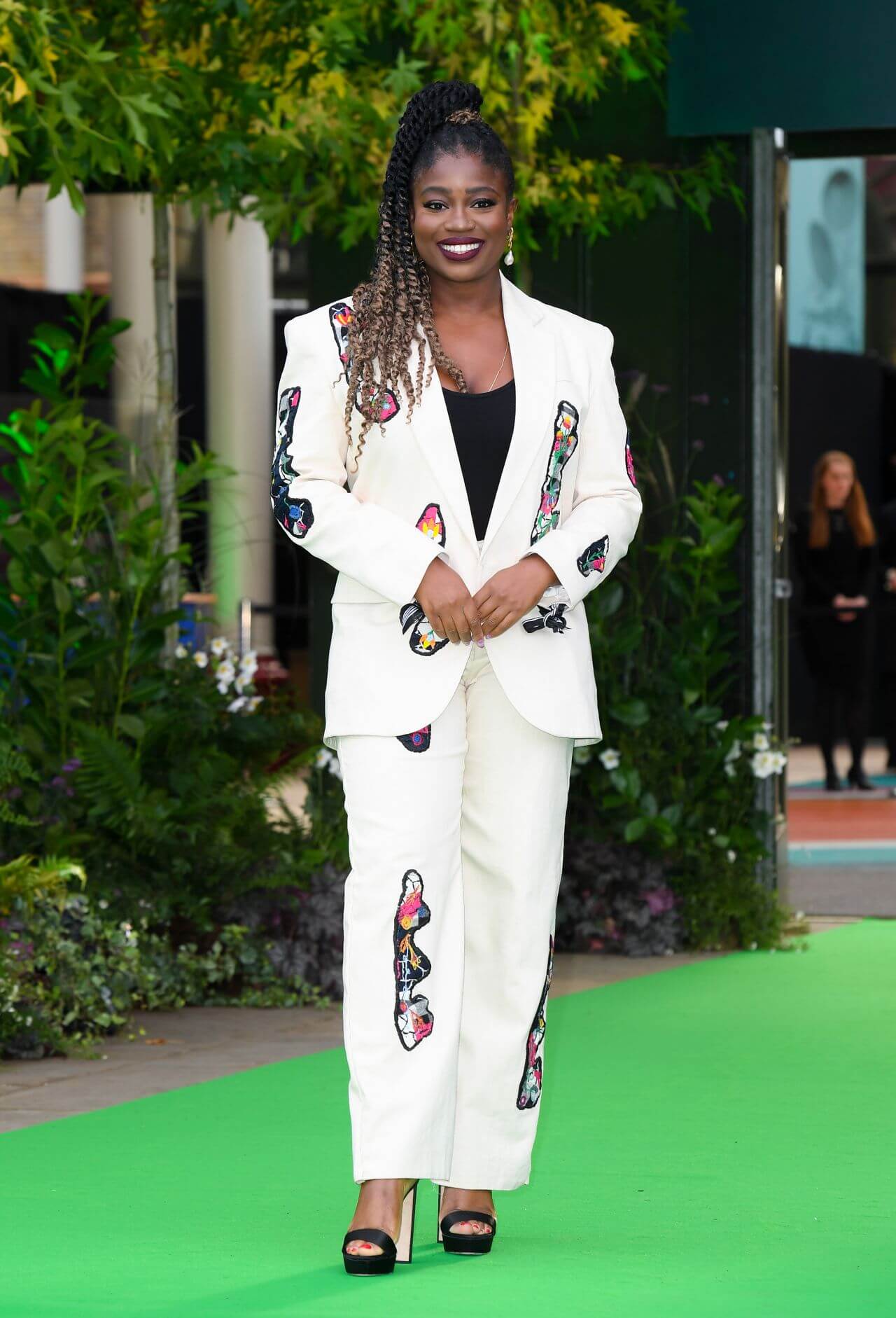 Clara Amfo  In White Patchwork Co-Ord Set At  The Earthshot Prize in London