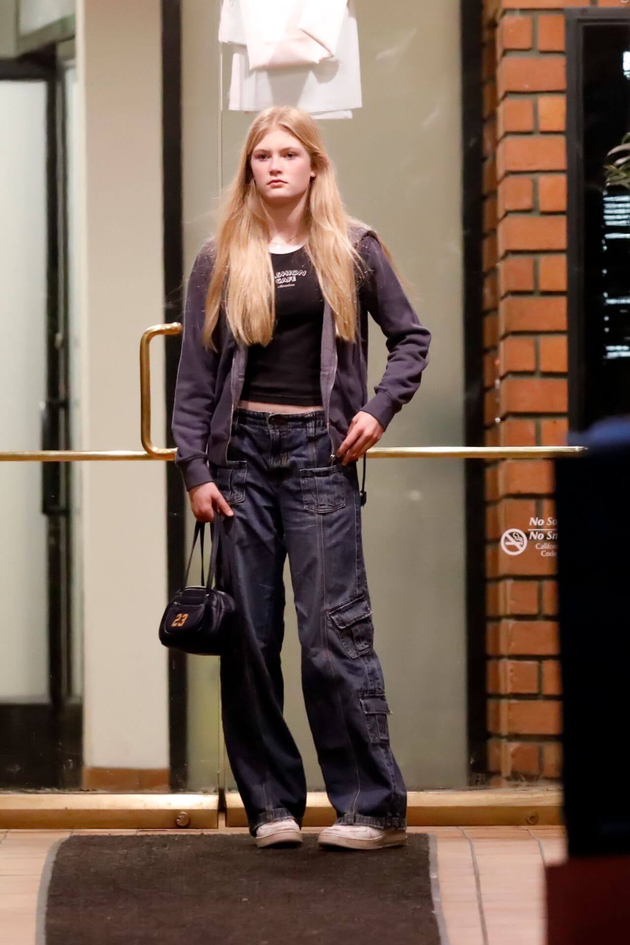 Claudia Schiffer In Black Jacket Under T-shirt With Cargo Pants Outfits
