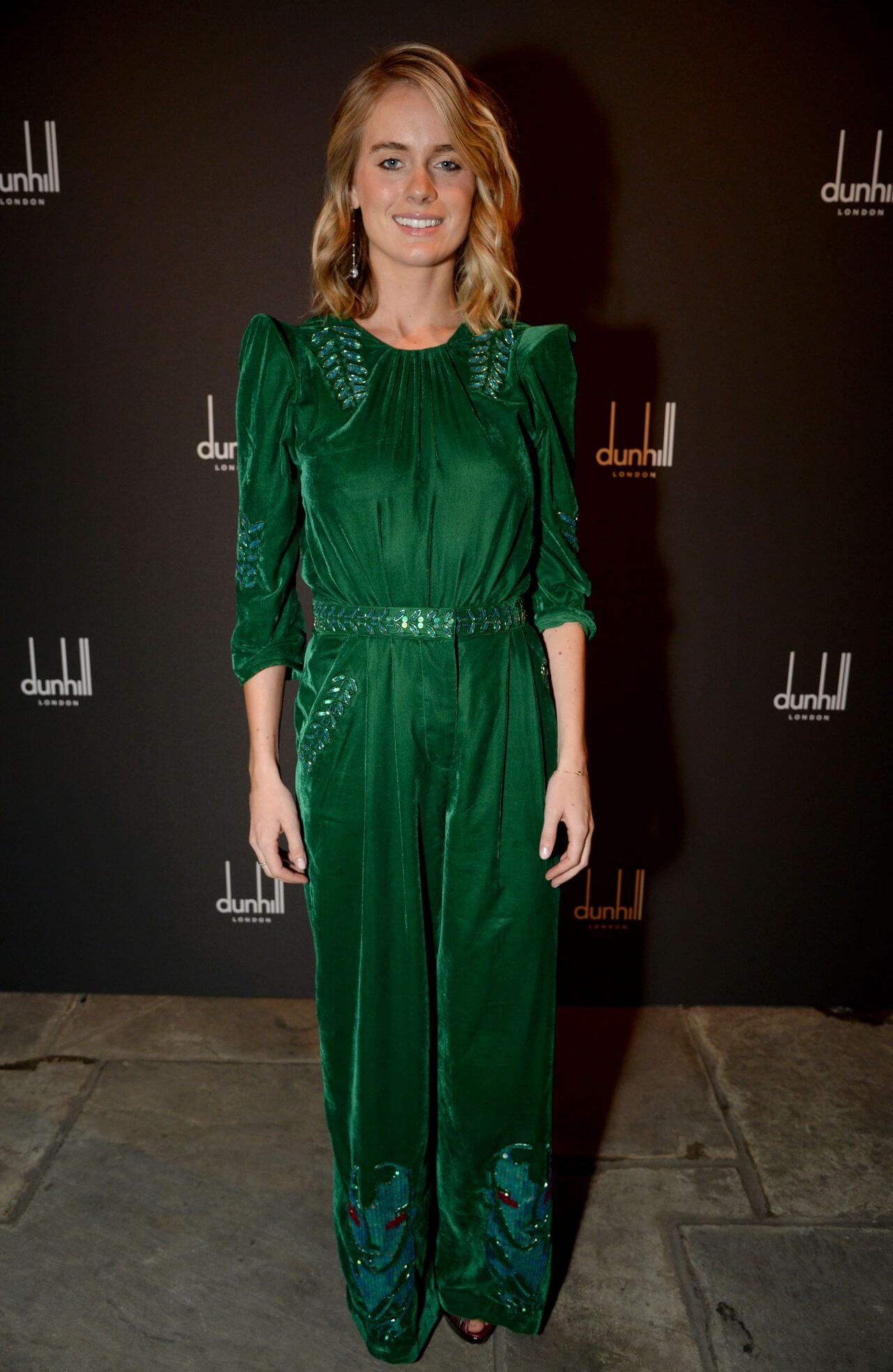 Cressida Bonas  In Bottle Green Puffed Sleeves Jumpsuit At Dunhill & GQ Pre-BAFTA Filmmakers Dinner And Party in London