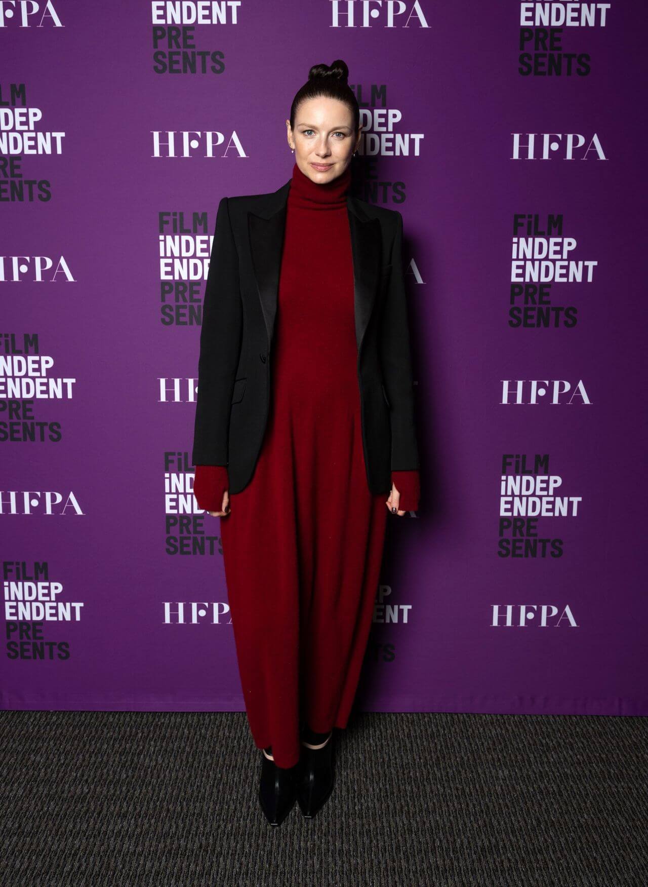 Caitriona Balfe In Maroon High Neck Long Dress with Black Blazer At Film Independent Screening of “Belfast” in LA