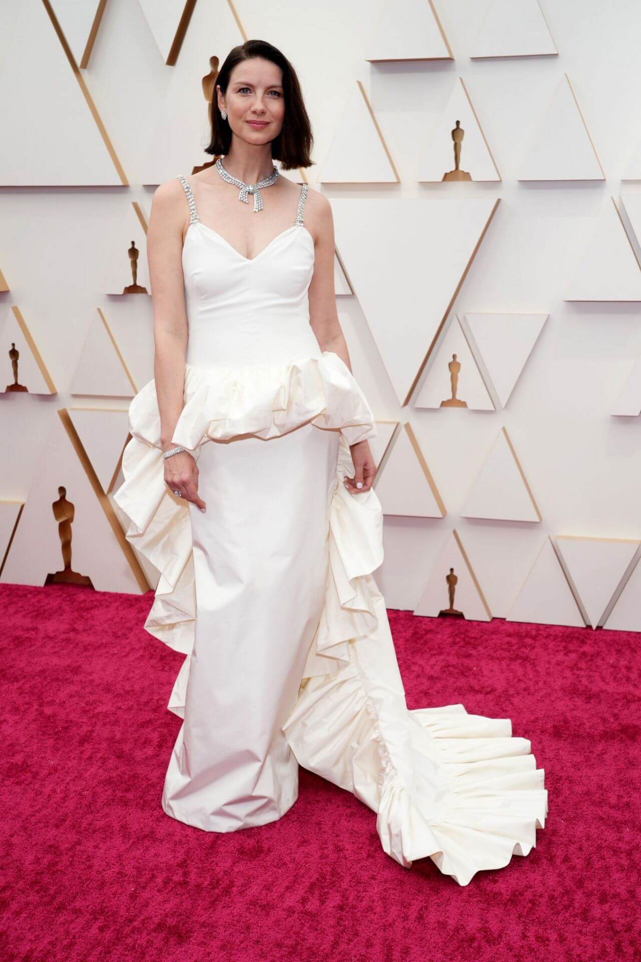 Caitriona Balfe Stunning Looks In Off White With Draping Style Ruffle Gown At Oscars  Red Carpet