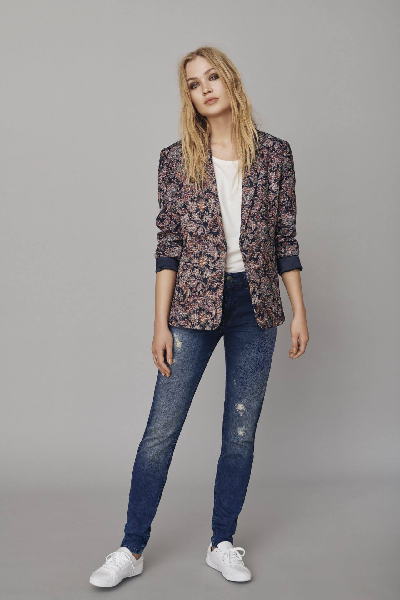Camilla Forchhammer Christensen In Printed Jacket Under White Top With Blue Denim Jeans Outfit