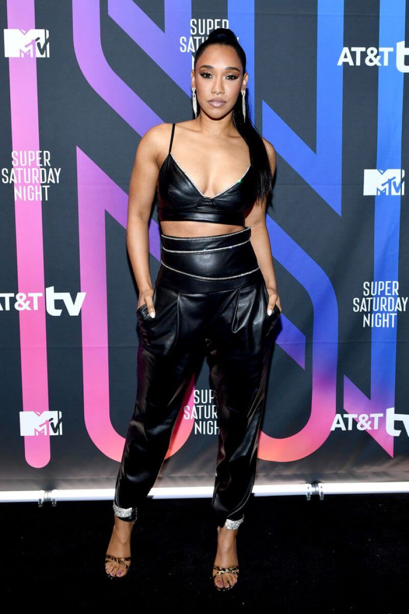 Candice Patton  In Black Leather Bralette Top With  Baggy Pants Outfits