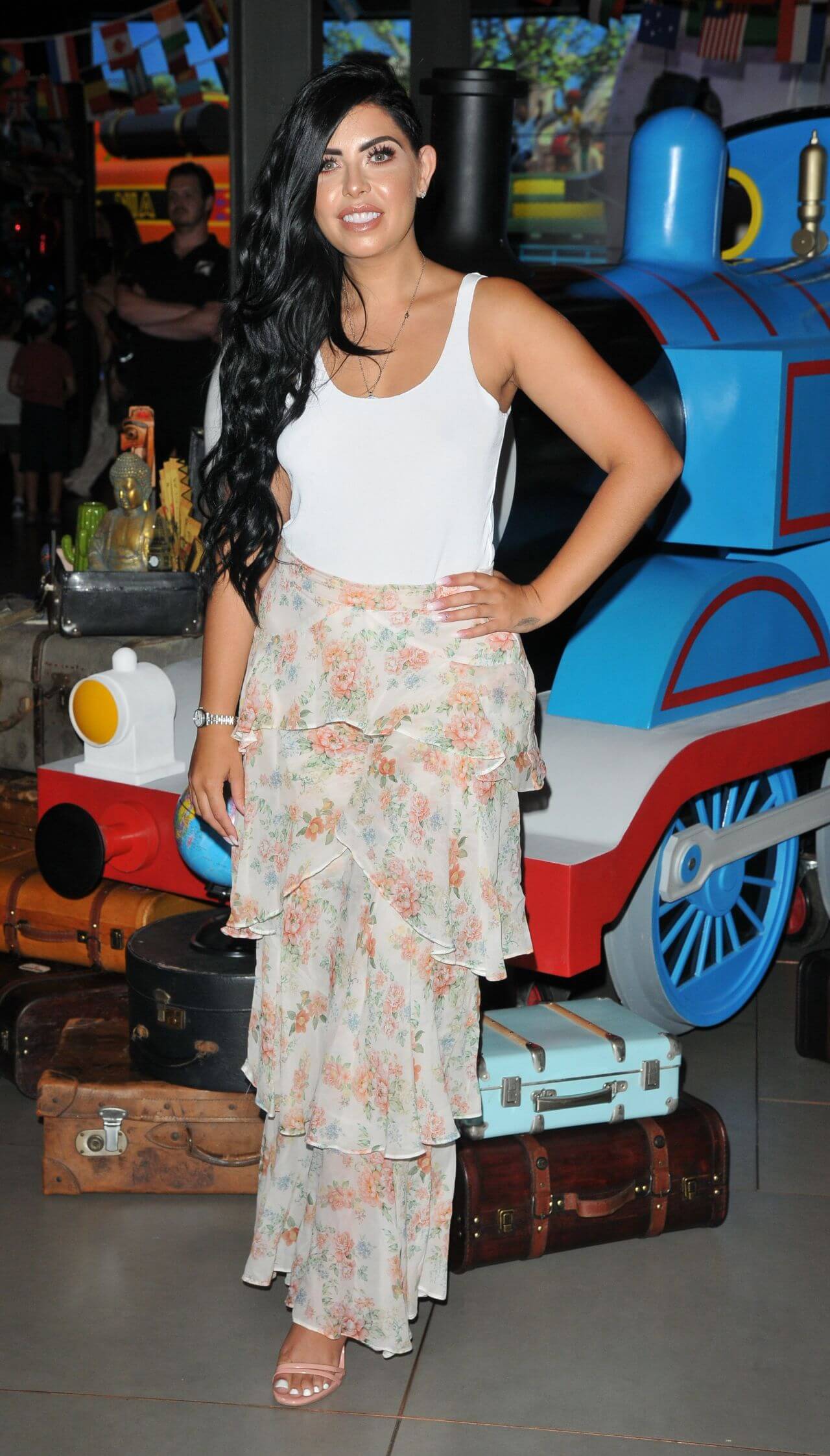 Cara de la Hoyde In Floral Print Ruffle Dress At “Thomas & Friends: Big World Big Adventures” Premiere in London