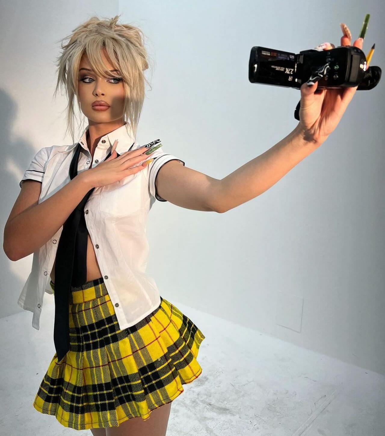 Carolina Marie Fabulous Looks In White Shirt With Yellow Checked Mini Skirt Outfits