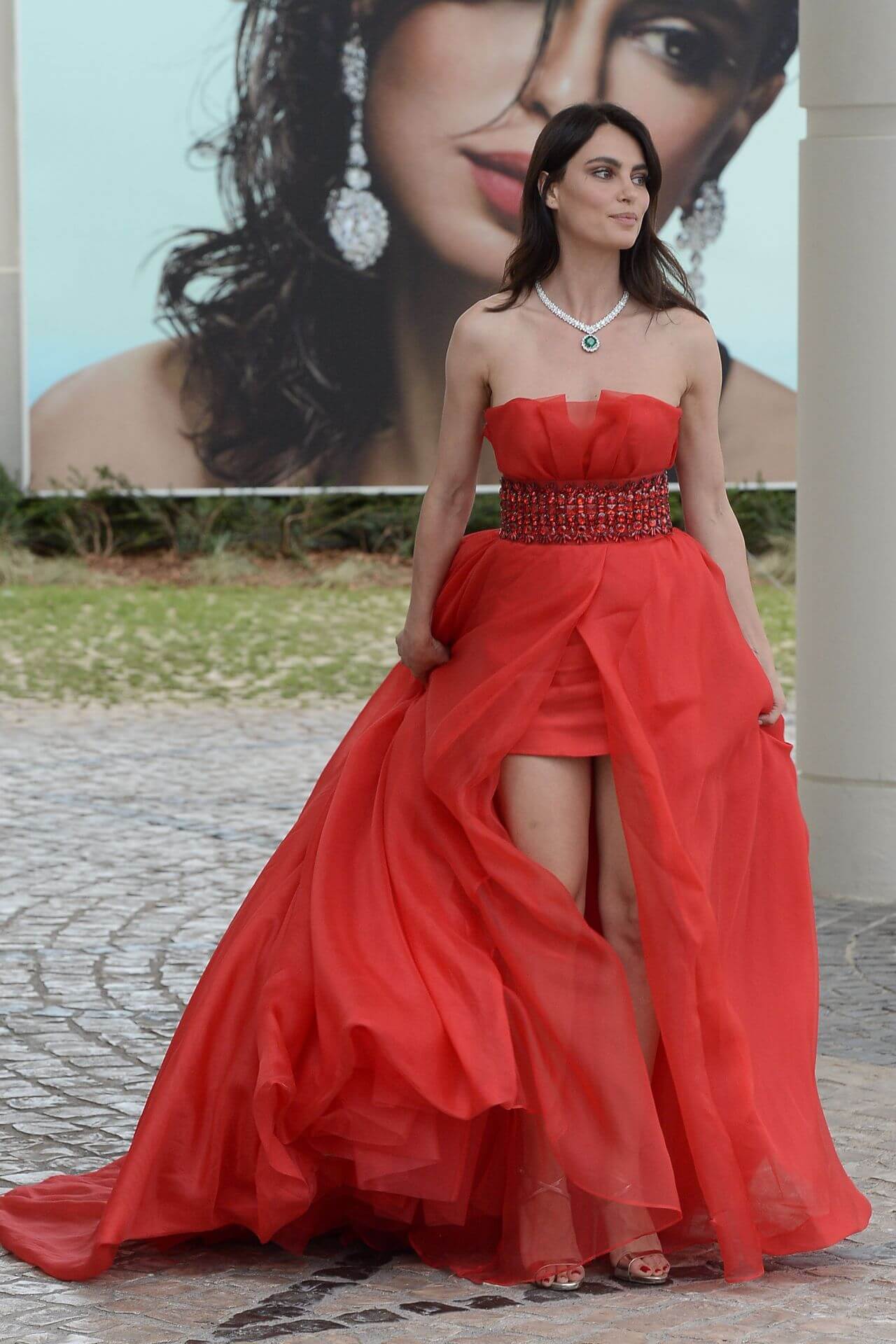 Catrinel Menghia Gorgeous Looks In Red Net Fabric Strapless A-Line Gown in Cannes