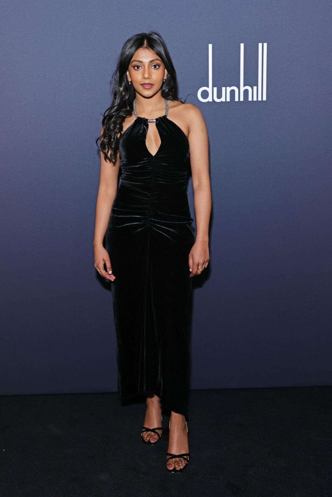 Charithra Chandran In Black Velvet Long Dress At Dunhill & BSBP Pre-BAFTA Filmmakers Dinner and Party in London