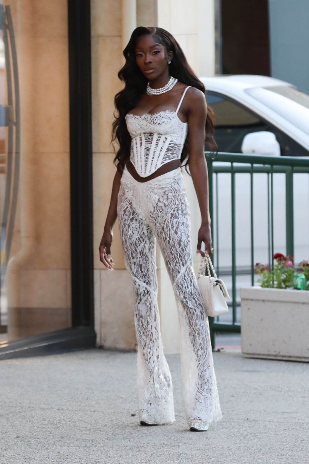 Chelsea Lazkani In White Co-Ord Set With Pearl Choker