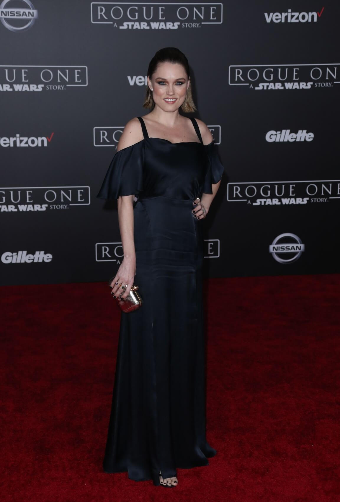 Clare Grant In Black Strap Sleeves Long Gown Dress At ‘Rogue One: A Star Wars Story Premiere in Hollywood