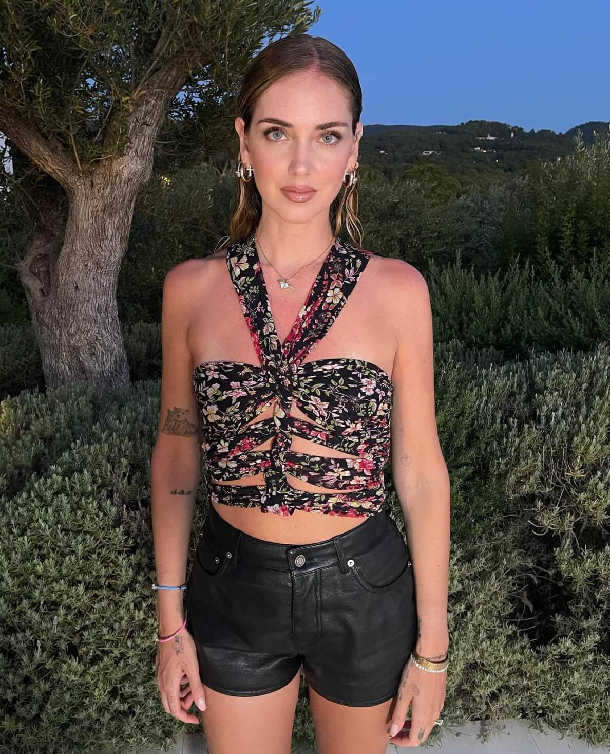 Chiara Ferragni Lovely Looks In Wrapped Top With Black Leather Shorts