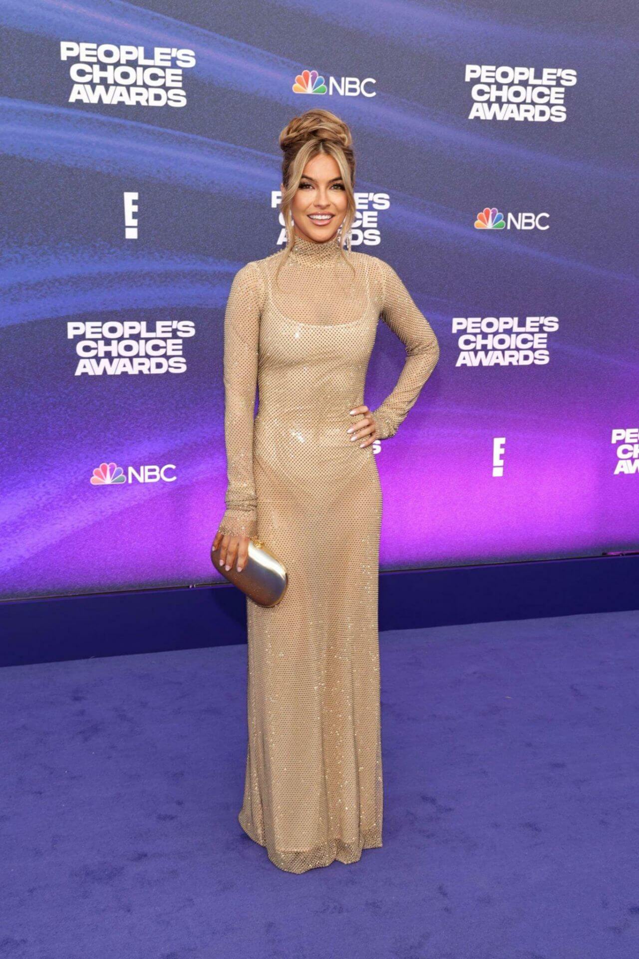 Chrishell Stause In Beige Net Fabric Transparent Long Dress At People’s Choice Awards in Santa Monica