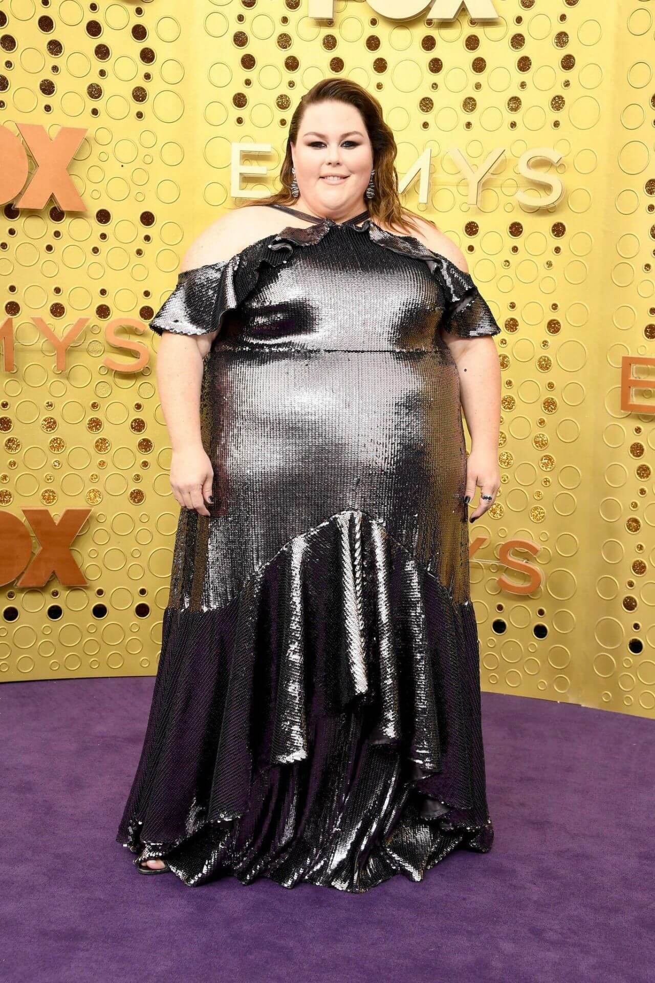 Chrissy Metz In Black Metallic Cris Cross Halter Neck Long Ruffle Dress At Emmy Awards in Los Angeles