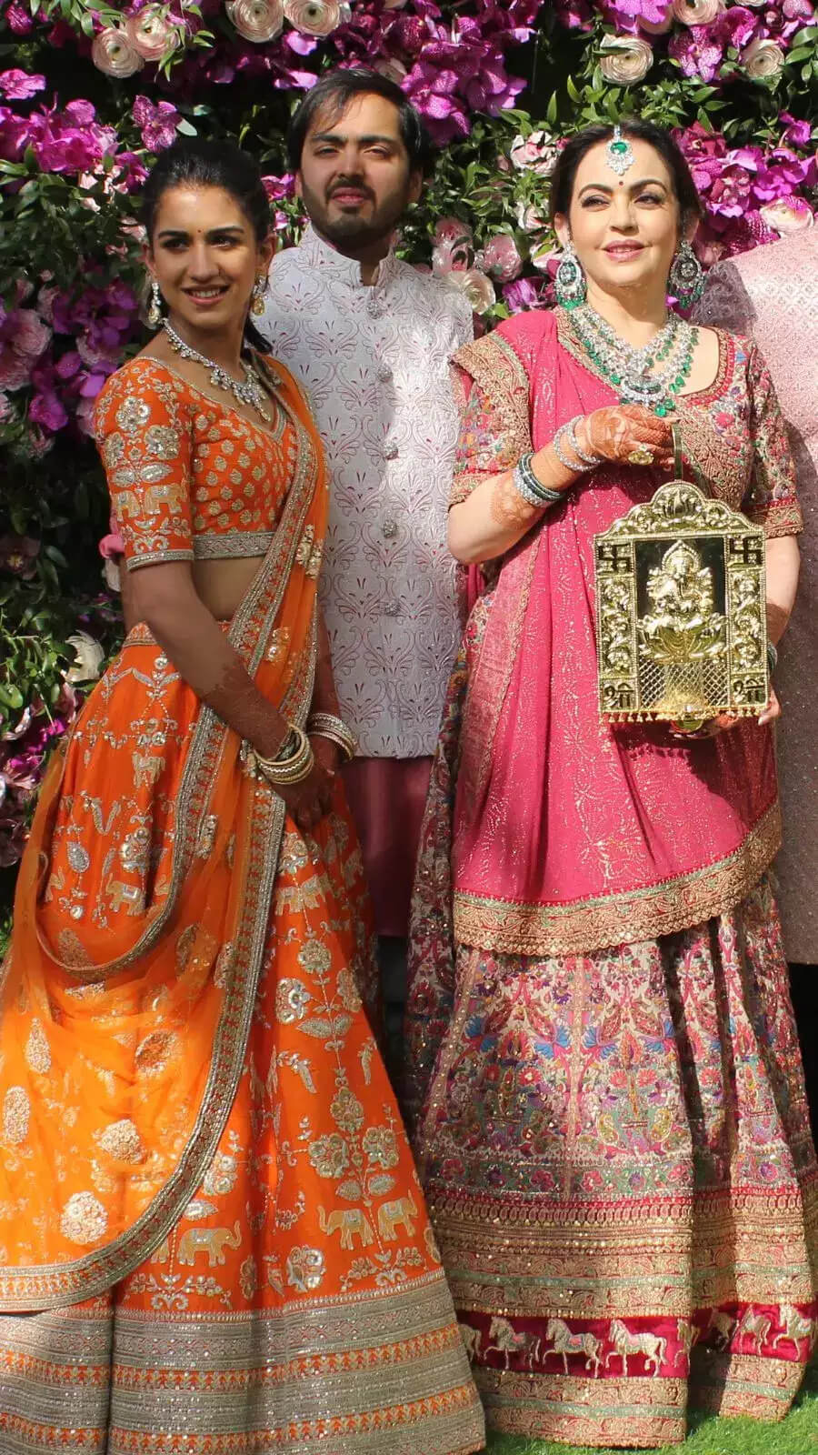 Radhika Merchant Wearing Orange Shimmery embroidery Lehenga set