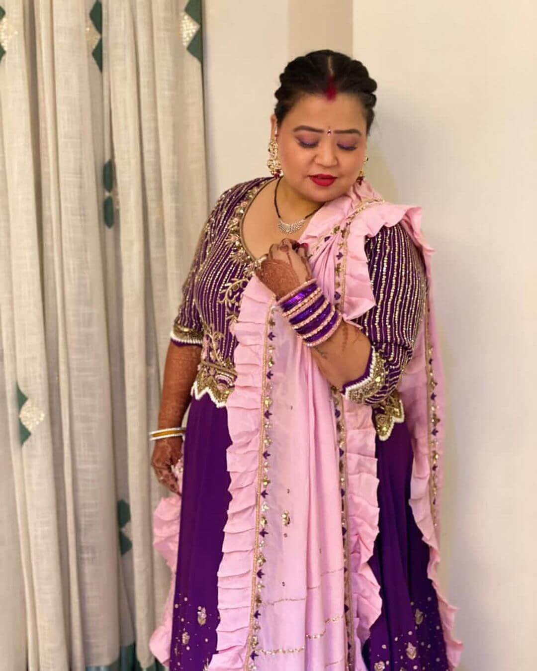 Beautiful Bharti Singh In Purple Embellished Gown Suit With Ruffle Dupptta