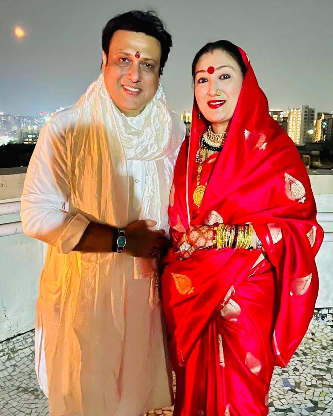 Sunita Ahuja Gorgeous In Red Silk Pattern Saree With Her Husband