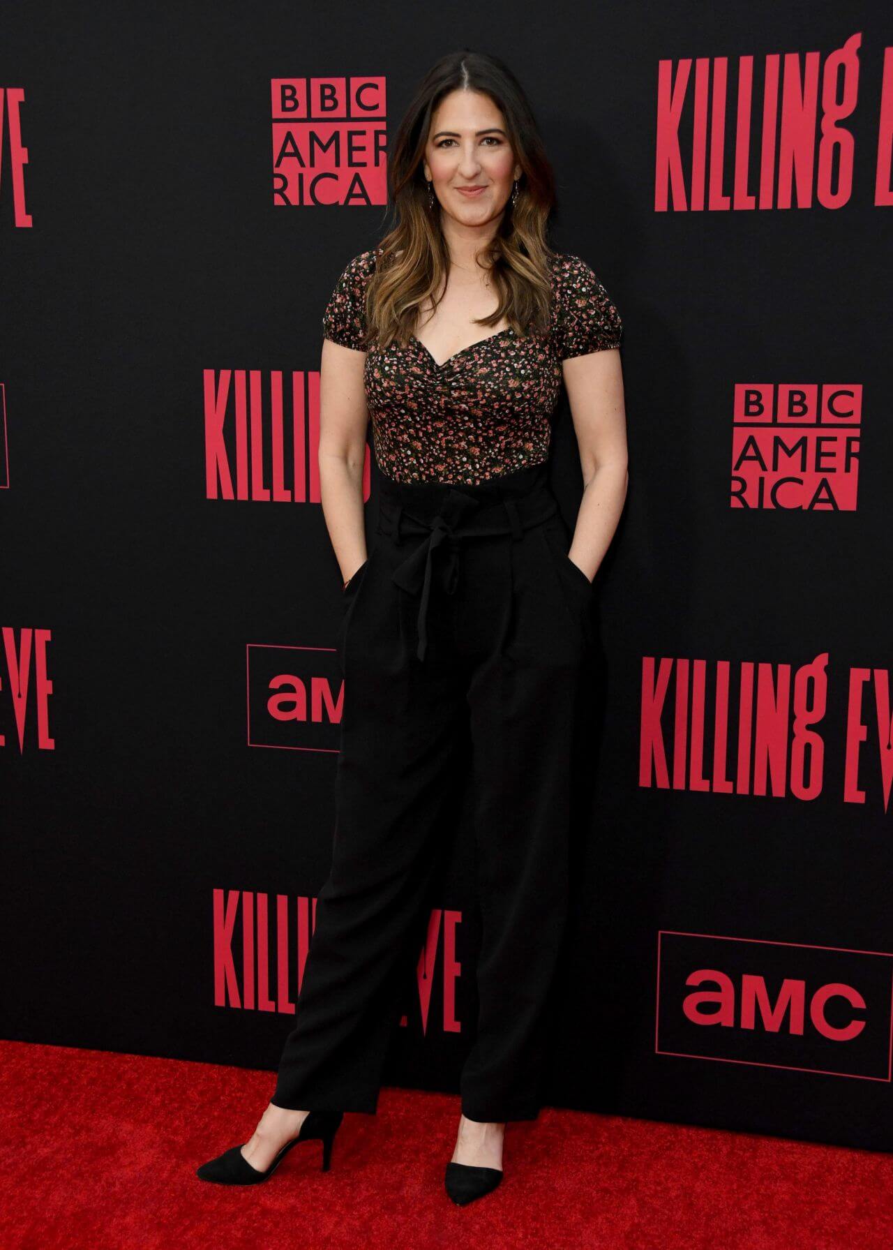 D’Arcy Carden In Printed Top With Black Pants 