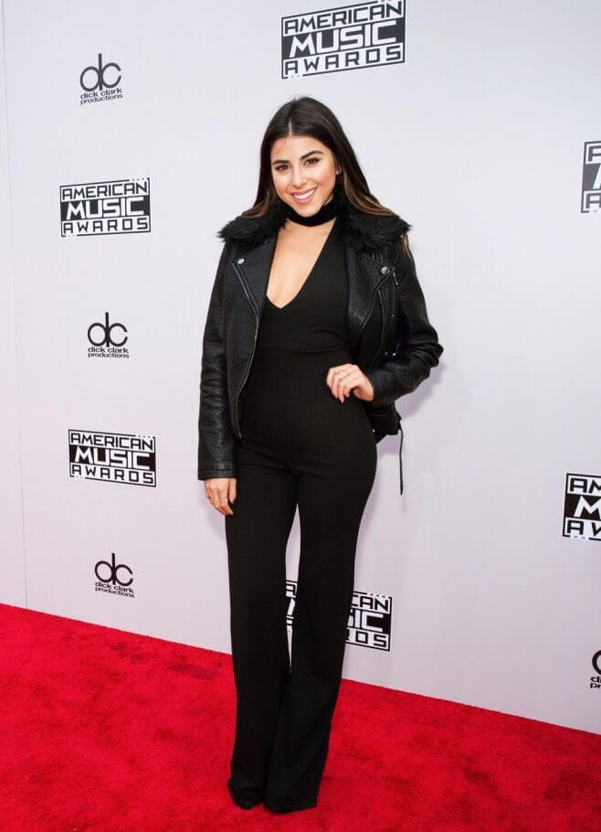 Daniella Monet In Black Jumpsuit With Leather Jacket