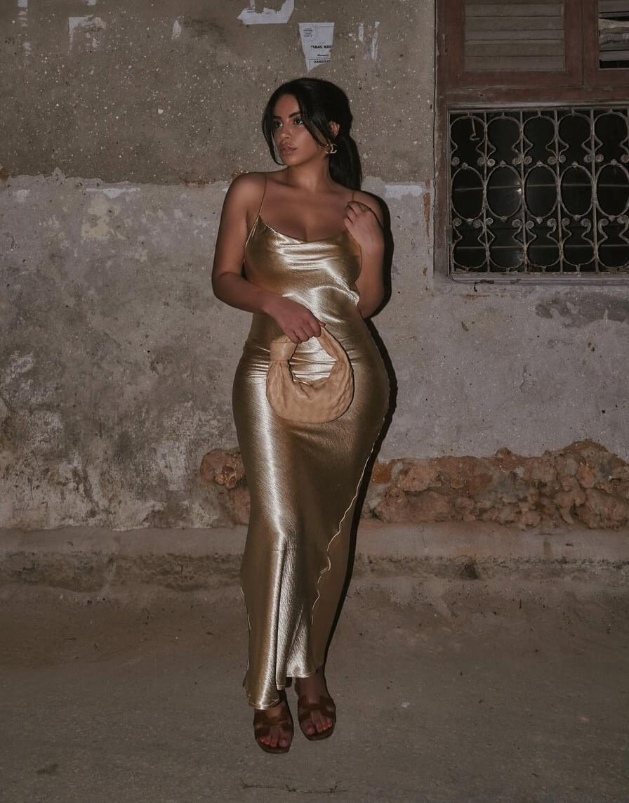 Selma Omari In Shiny Golden Long Dress