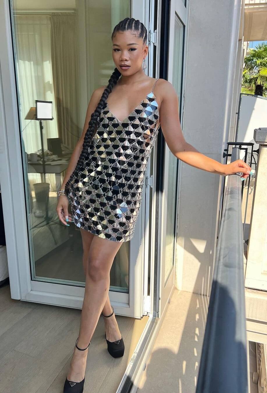 Storm Reid In Golden And Black Metal Sequence Dress