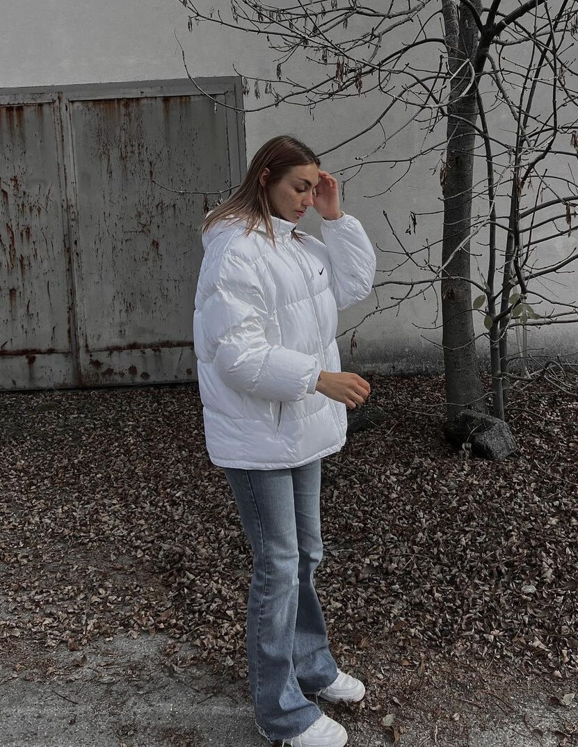 Tina Neumann In White Bomber Jacket With Denim Jeans