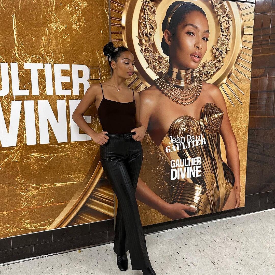 Yara Shahidi In Black Strap Sleeve Top With Leather Pants