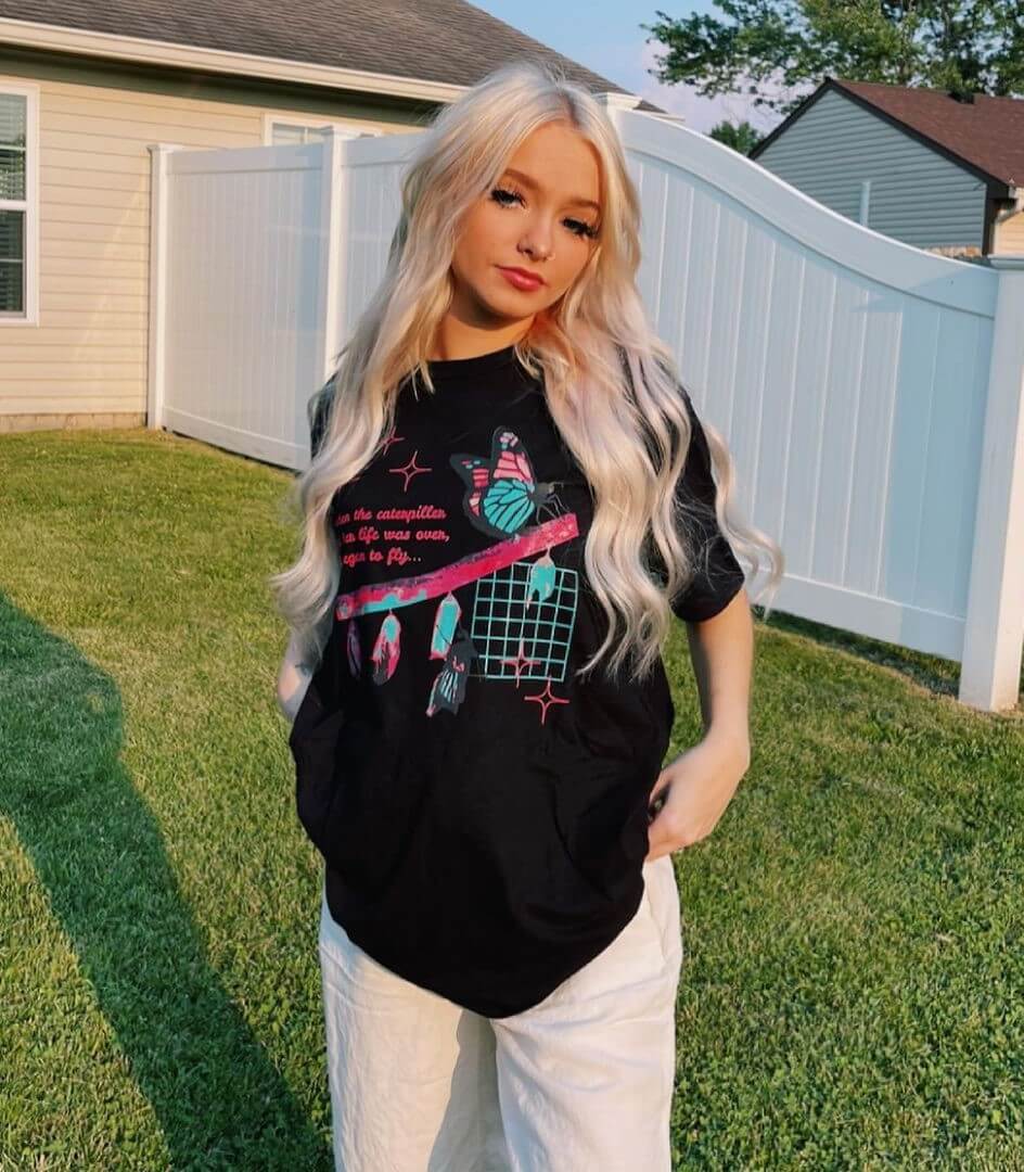 Zoe Laverne In Black T-shirt With White Pants