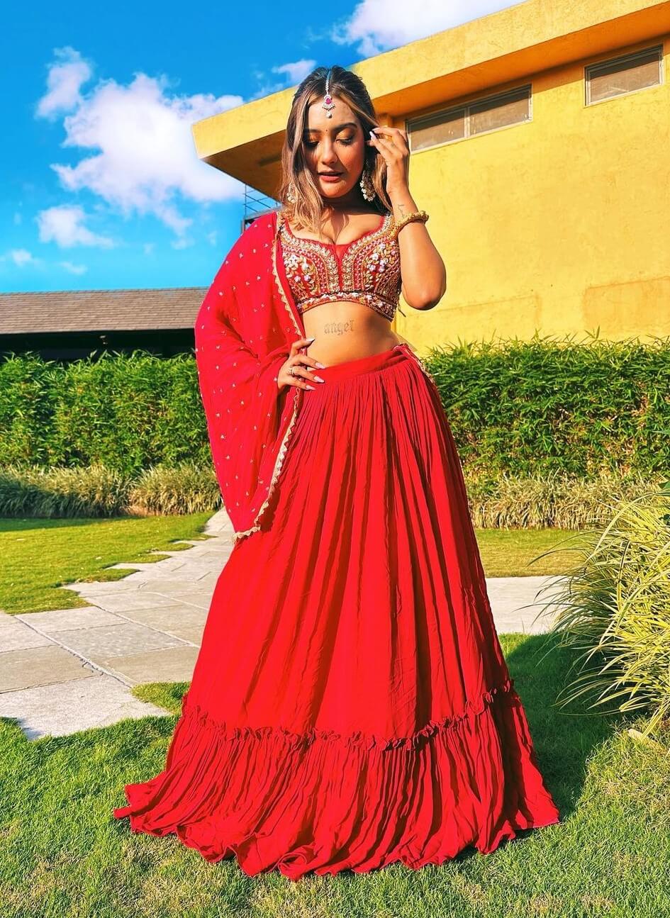 Aashika Bhatia In Red Stonework Blouse With Frill Lehenga Set