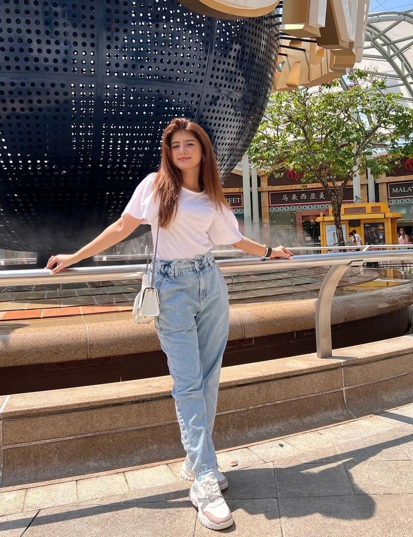 Arishfa Khan In White Top With Denim Bottoms