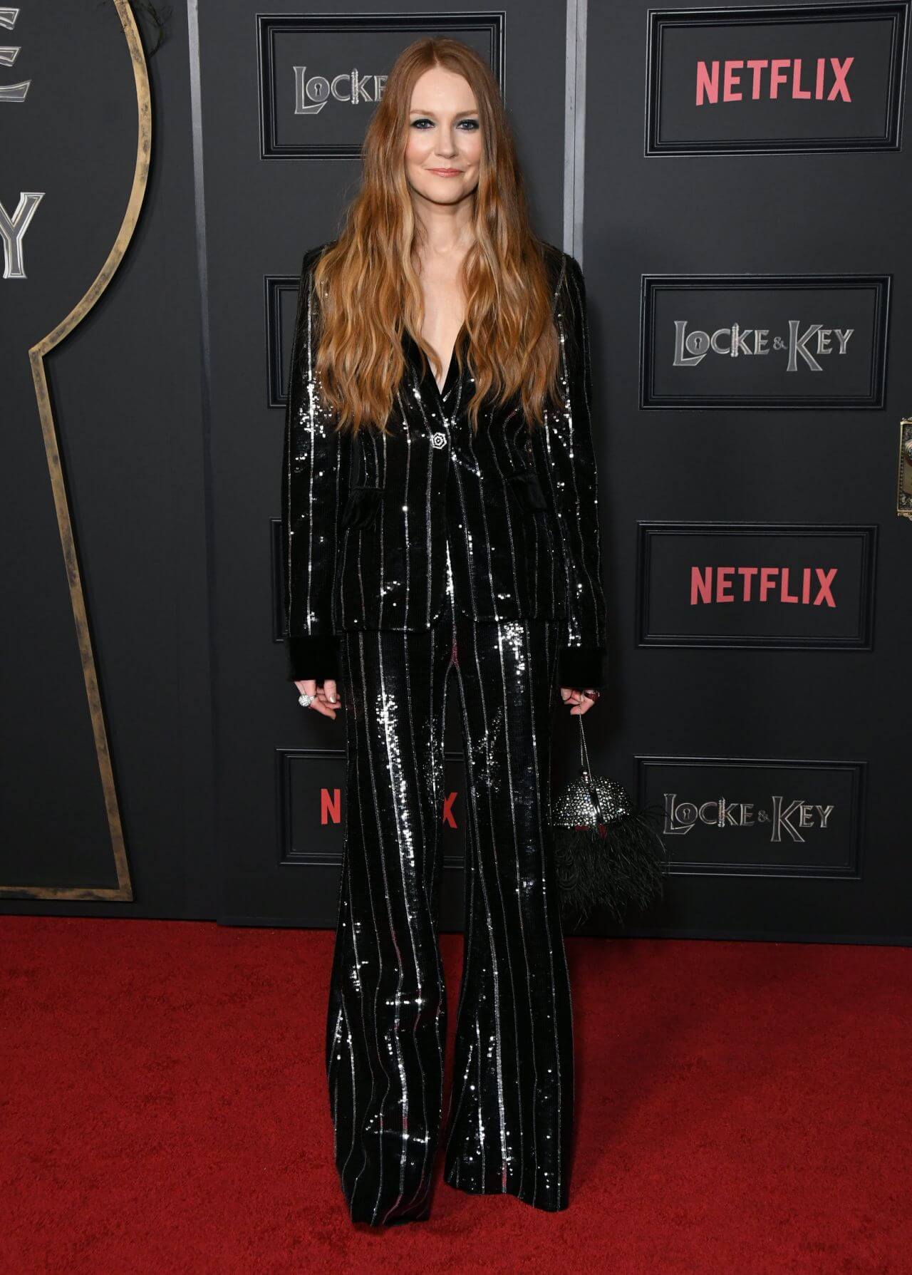 Darby Stanchfield In Shiny Black Co-Ord Set