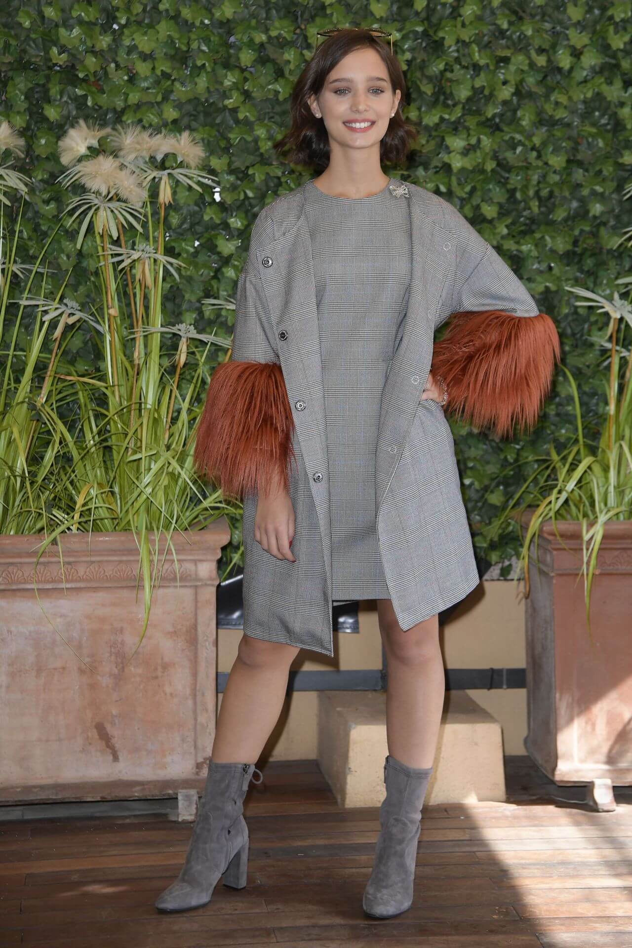 Denise Tantucci In Grey Checked Long Coat With Short Dress