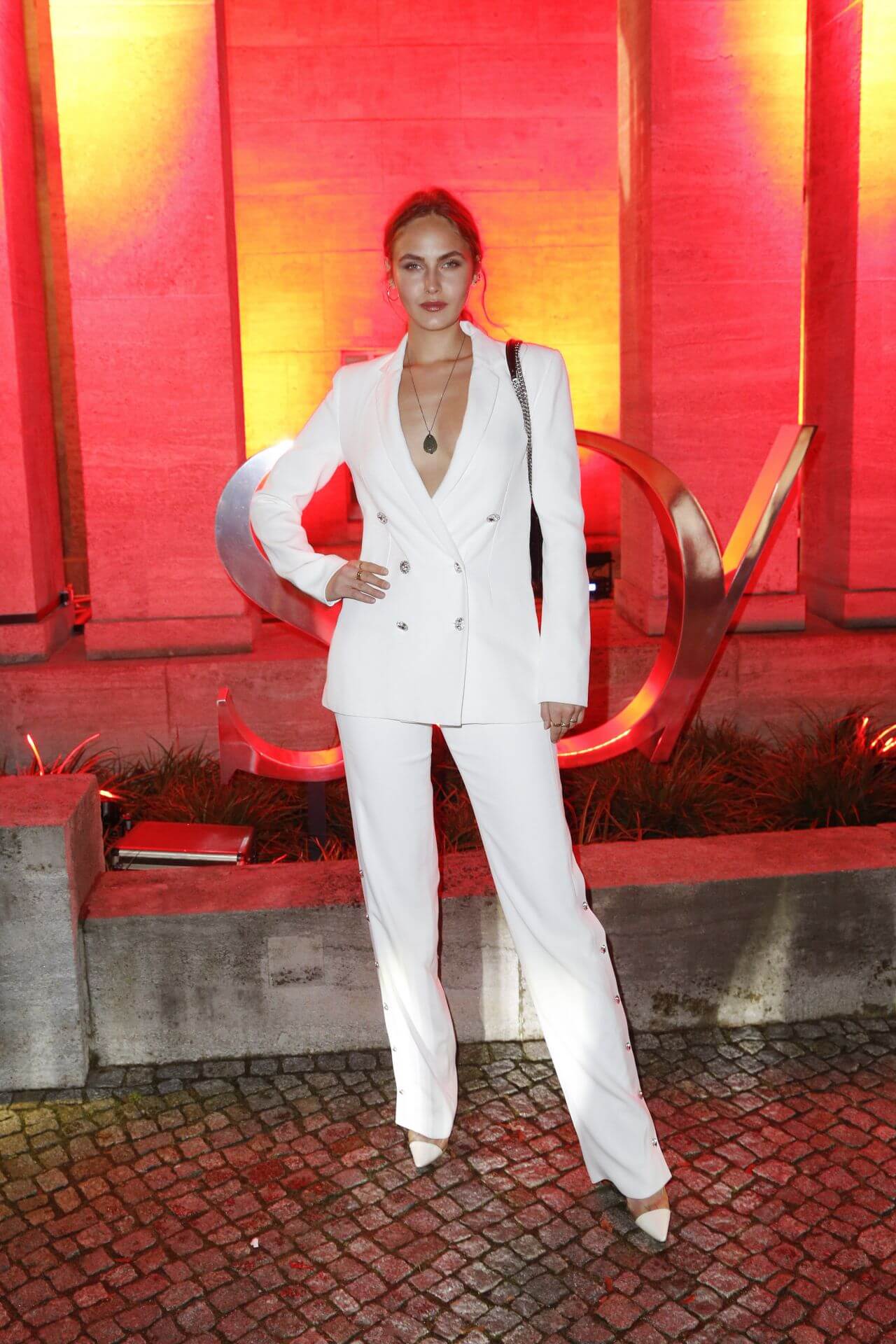 Elena Carriere  In White Blazer With Pants Outfit
