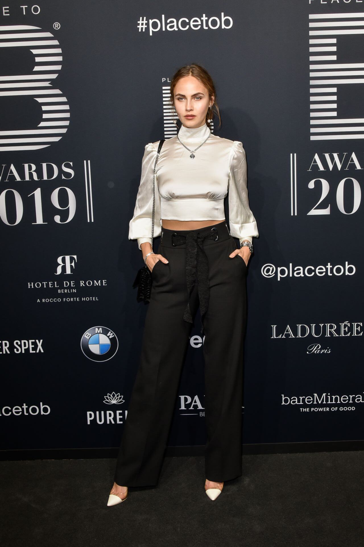 Elena Carriere  In a White Baggy Crop Top With Pants