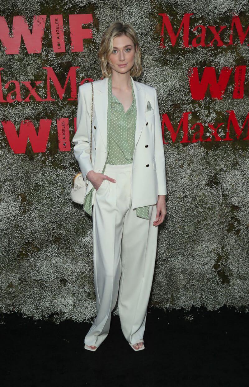 Elizabeth Debicki In White Blazer And Pants With Printed Top