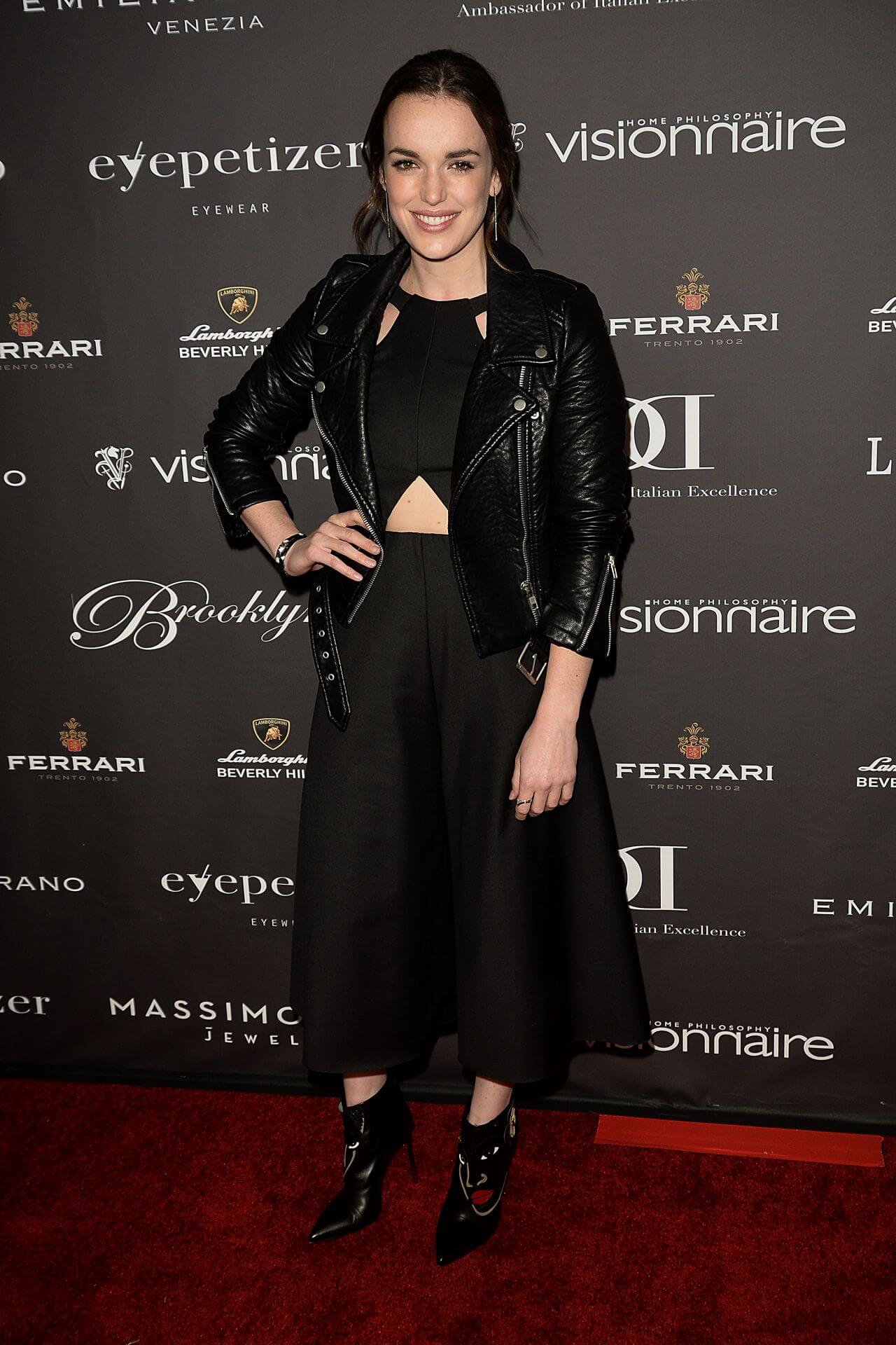Elizabeth Henstridge In Black Cut Out Outfit With Leather Jacket