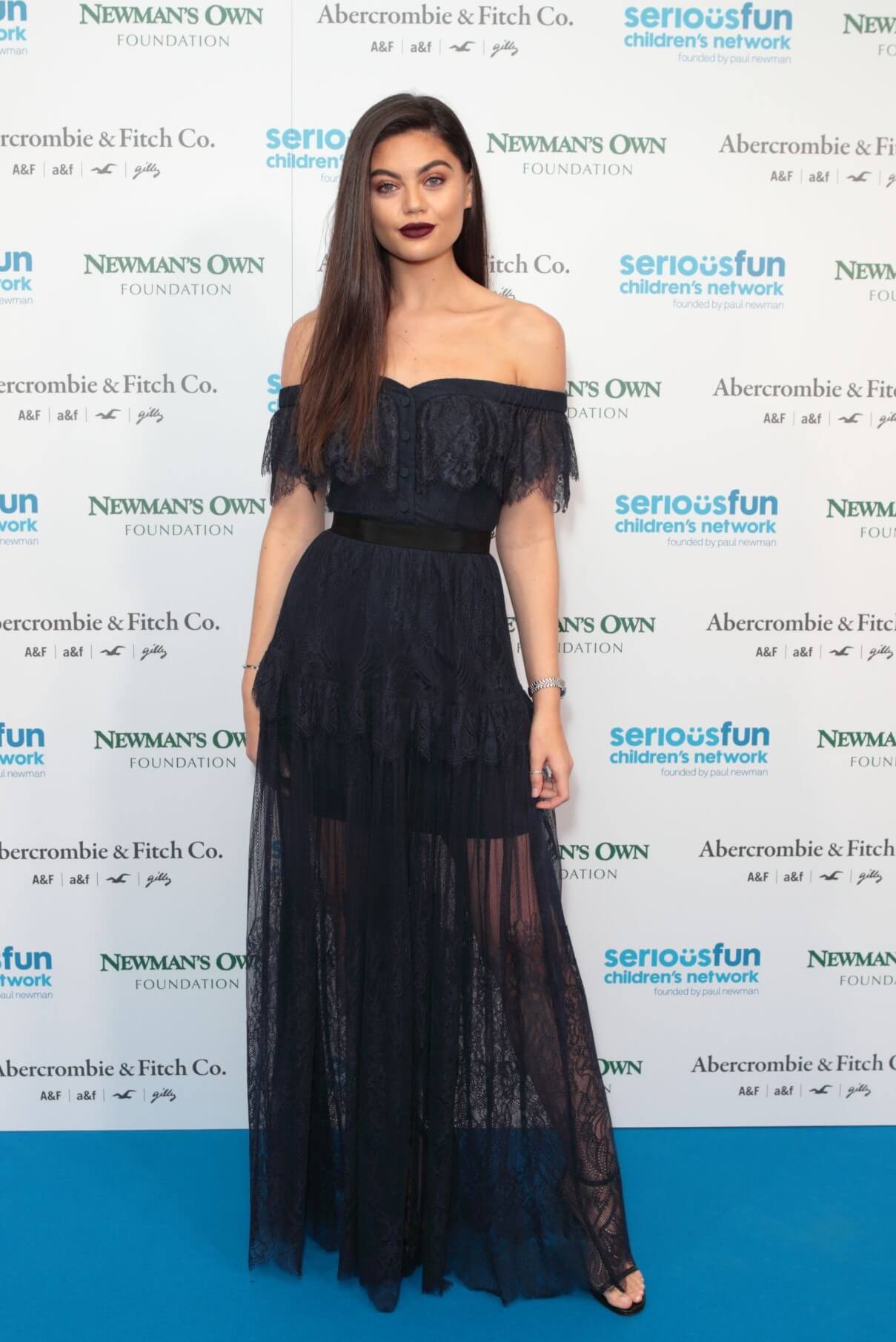 Emily Canham  In Black Off Shoulder Long Gown