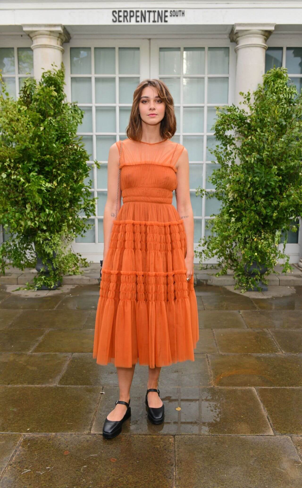 Emma Appleton In Orange Frill Long Gown